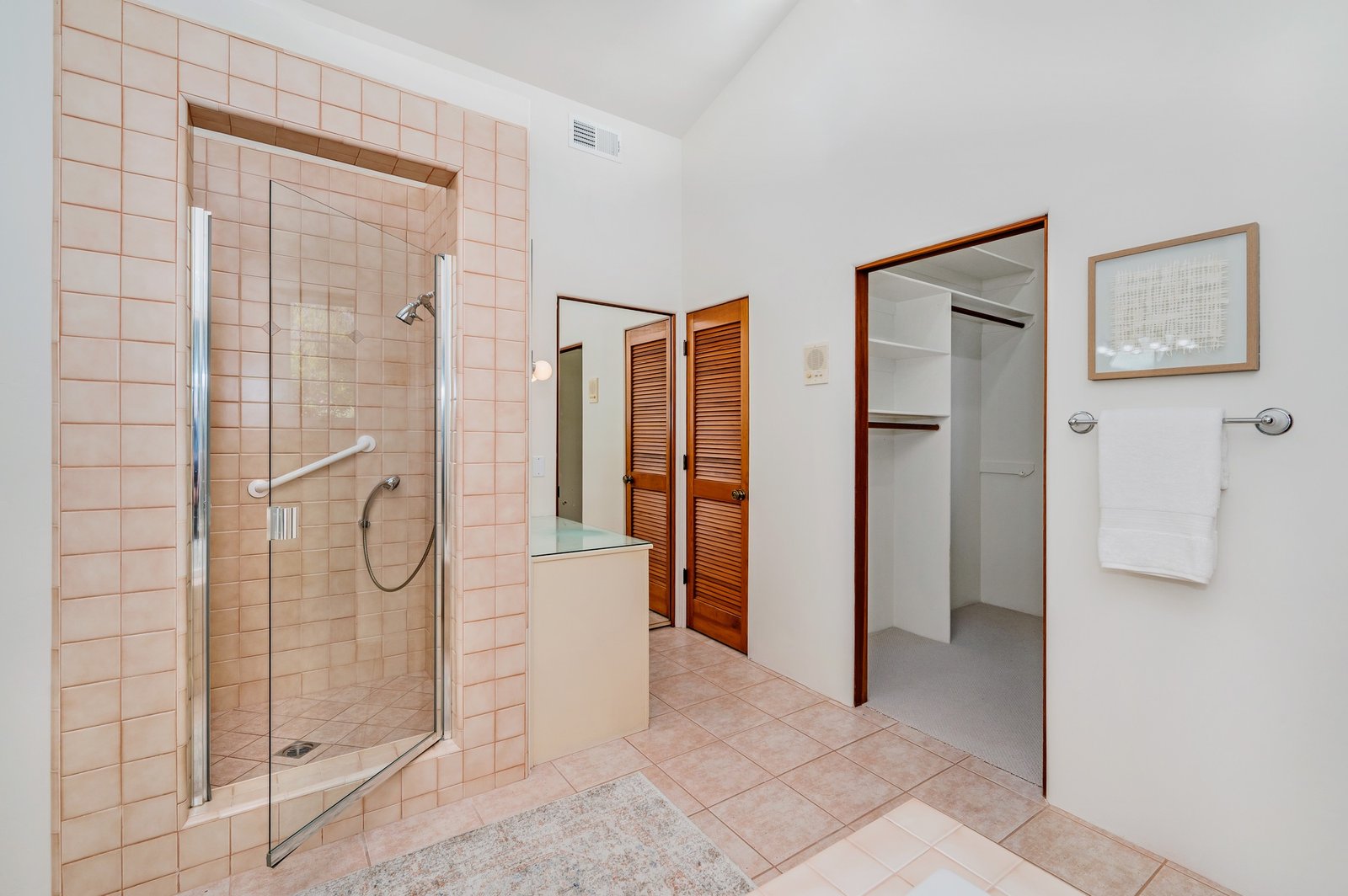 a bathroom with tiled walls and tile floors is shown here